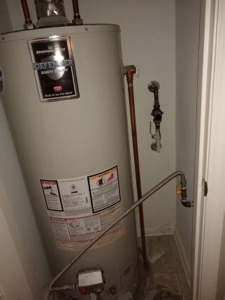 water heater overflow pipe running|How To Fix An Overflow Pipe 